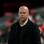 Arne Slot Soroti Inkonsistensi Wasit Soal Kartu Merah Marc Guehi Usai Liverpool Takluk dari Man City